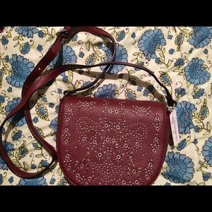 Charming Charlie burgundy, adjustable strap purse